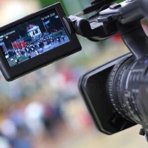 A video camera is being used to record an event.