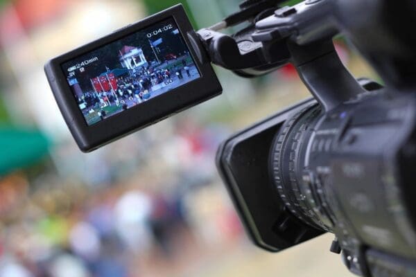 A video camera is being used to record an event.