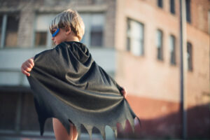 A kid with batman costume