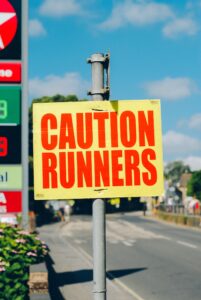 A caution sign on the side of a road.